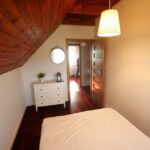 pokój z łóżkiem w domku do wynajęcia na kaszubach